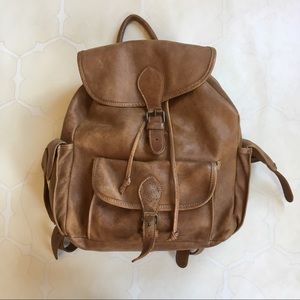 roots leather backpack purse